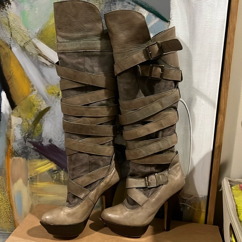 Dolce Vita strappy leather boots.